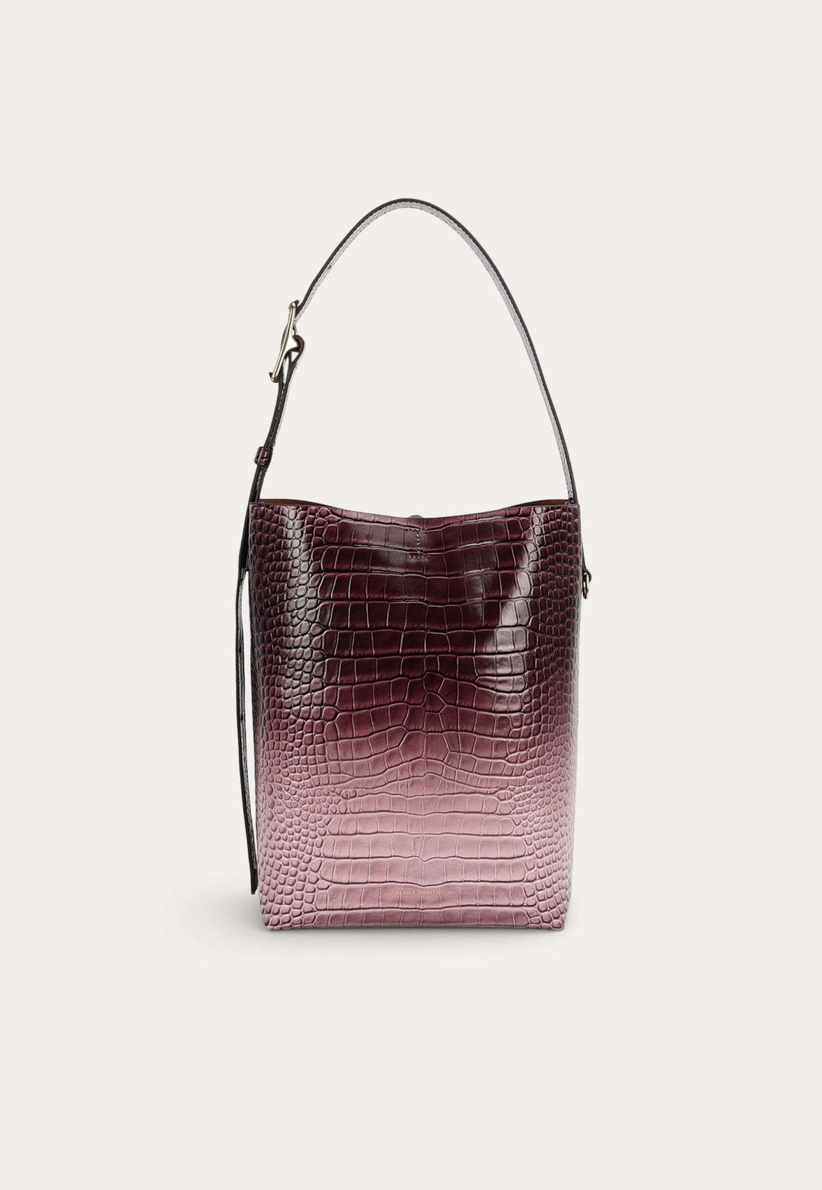 The Deadly Ponies Bellboy Tote in Eclipse Croc is crafted from premium croc-embossed calf leather.
