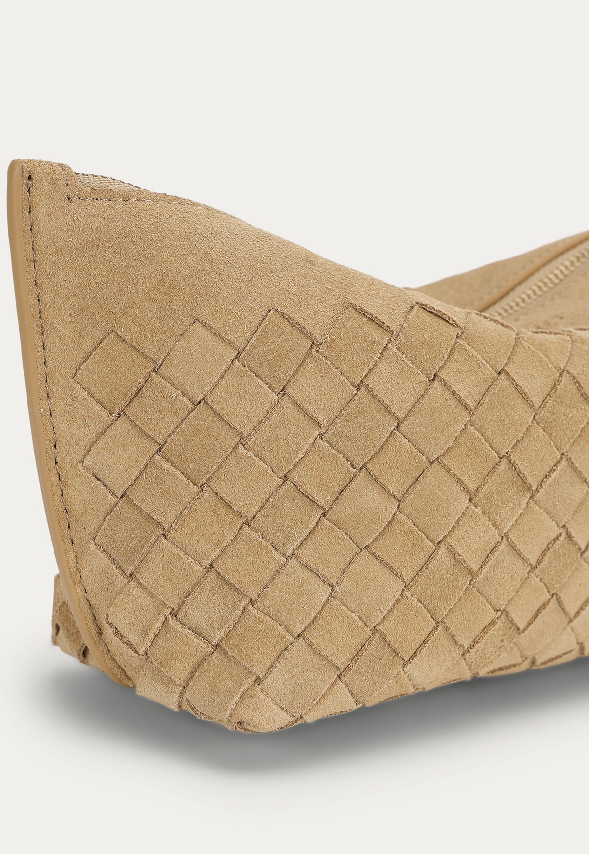 Close up of the Deadly Ponies Medium Poucher in Oat Woven Suede.