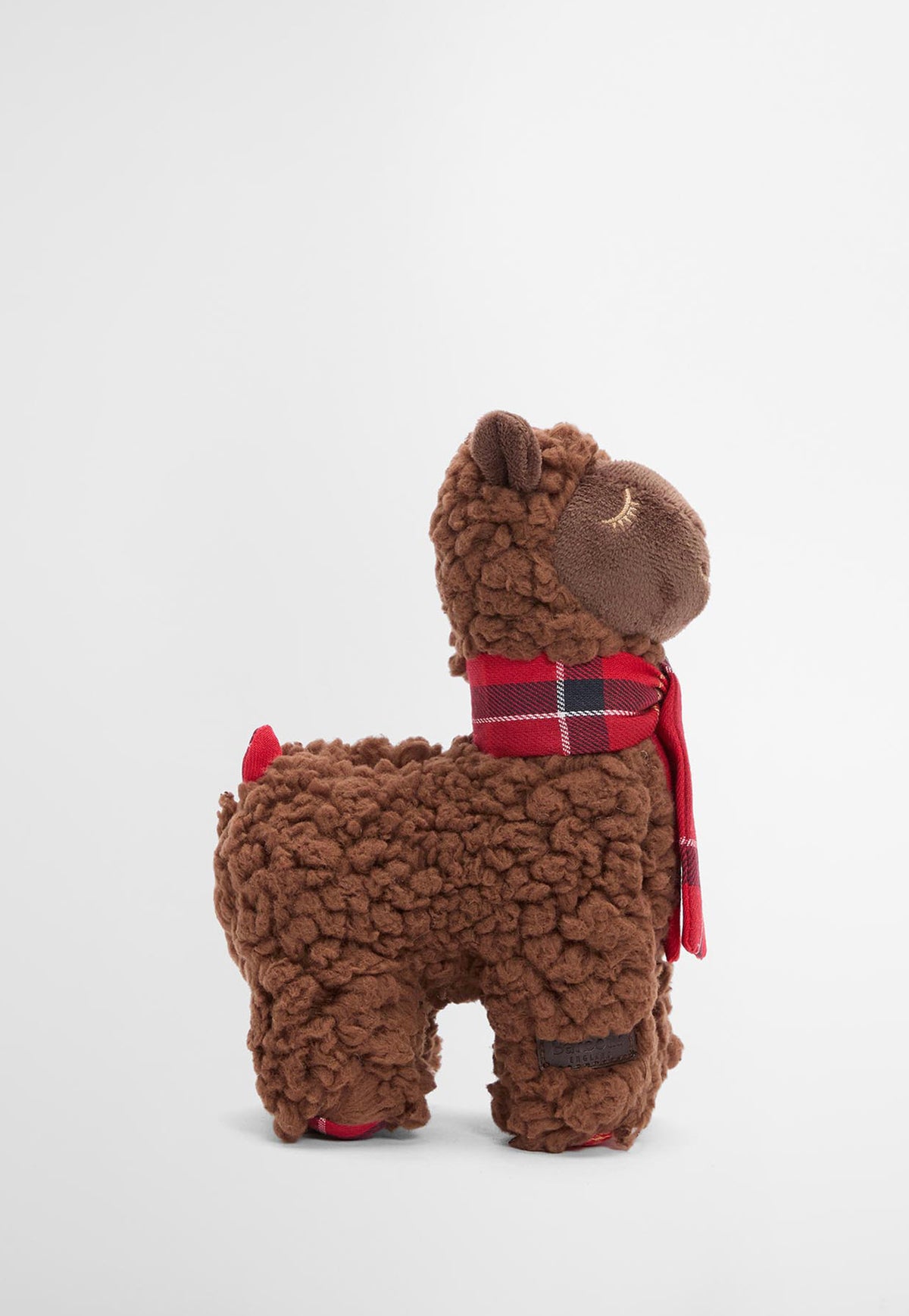 Barbour Llama Dog Toy featuring a soft plush llama design with a signature tartan scarf.