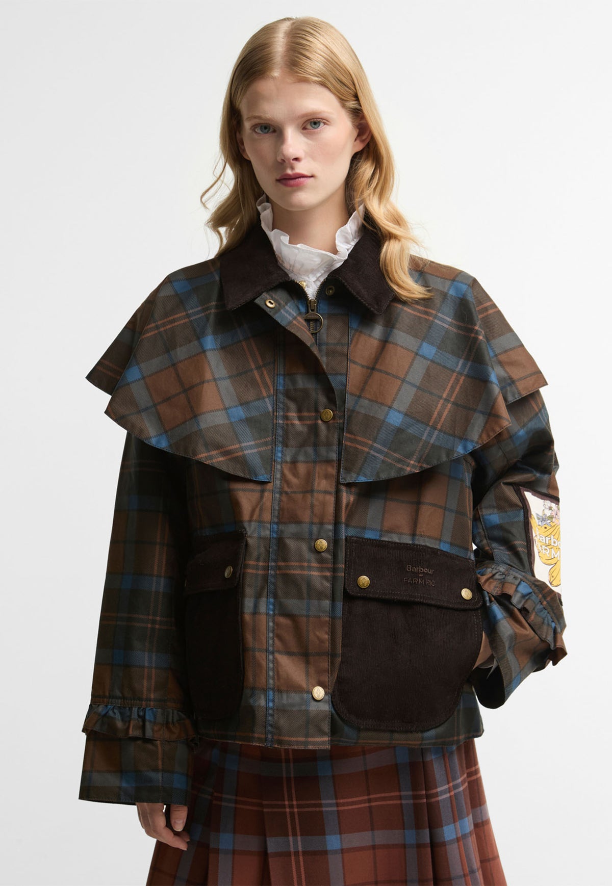 Barbour x FARM Rio Angelina Wax Jacket in Tropical Tea Tartan with caped shoulders and frilled cuffs