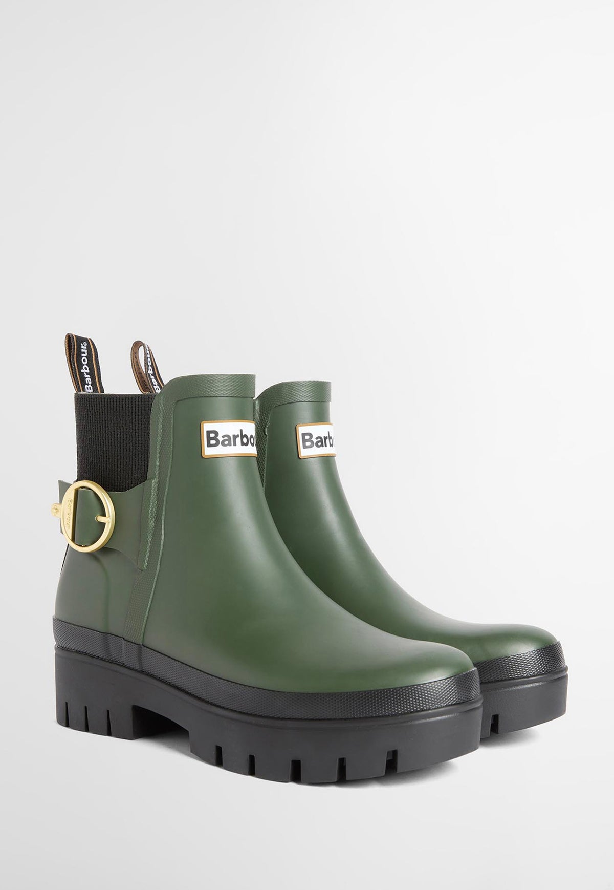 Side front profile of Barbour Hepburn Ankle Wellingtons in Olive Black showing ribbed elastic side panels, chunky rubber sole and Chelsea boot silhouette.
