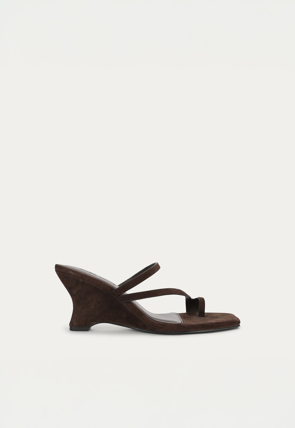 The Deadly Ponies Ariadne Wedge in Java Suede is crafted from premium suede with a soft lamb nappa leather footbed.