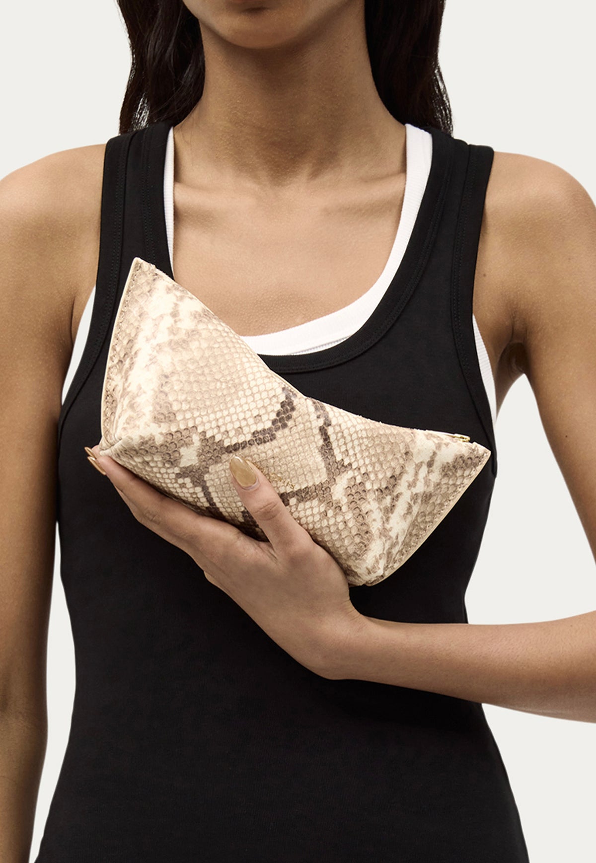 The Deadly Ponies Medium Poucher in Desert Python is crafted from premium python-embossed calf leather.