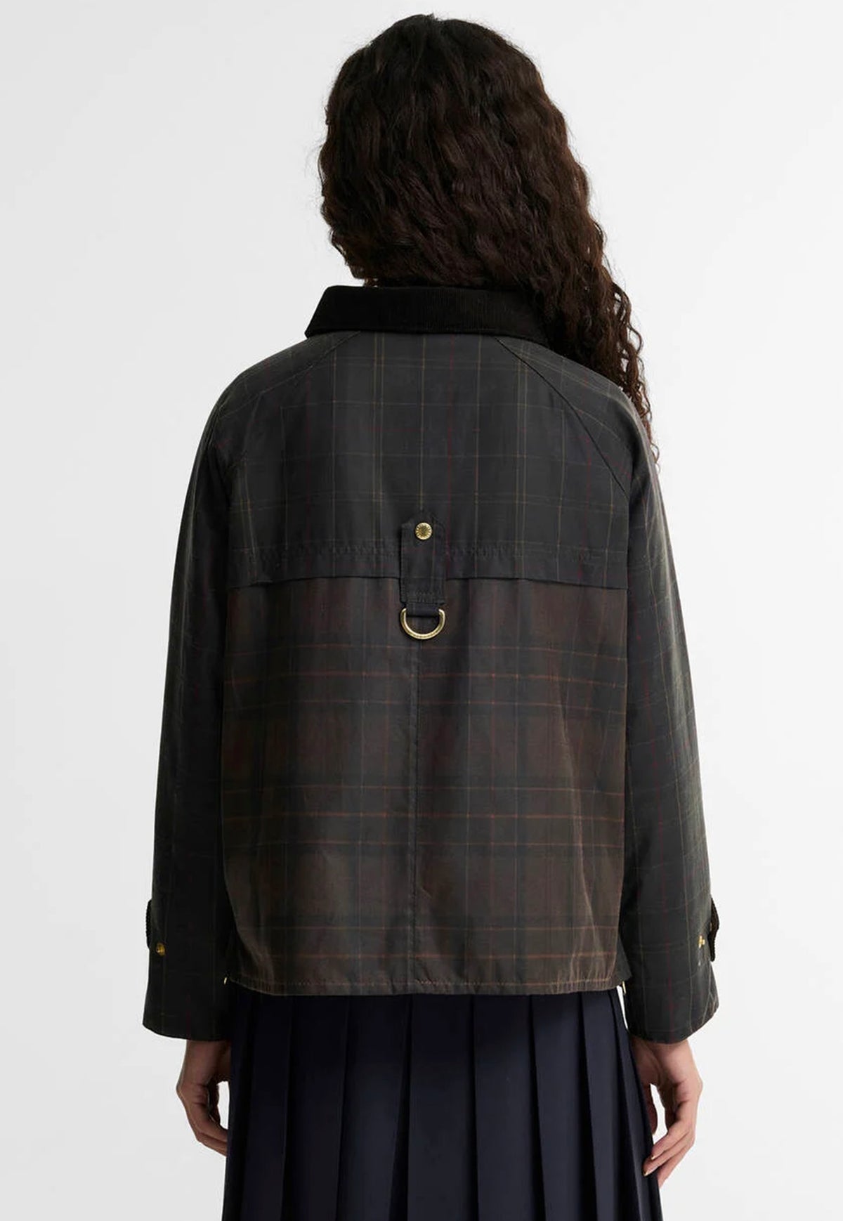 Back of the Barbour Hazelwood Checked Waxed Jacket showing the distinctive patchwork check pattern and waxed cotton finish.