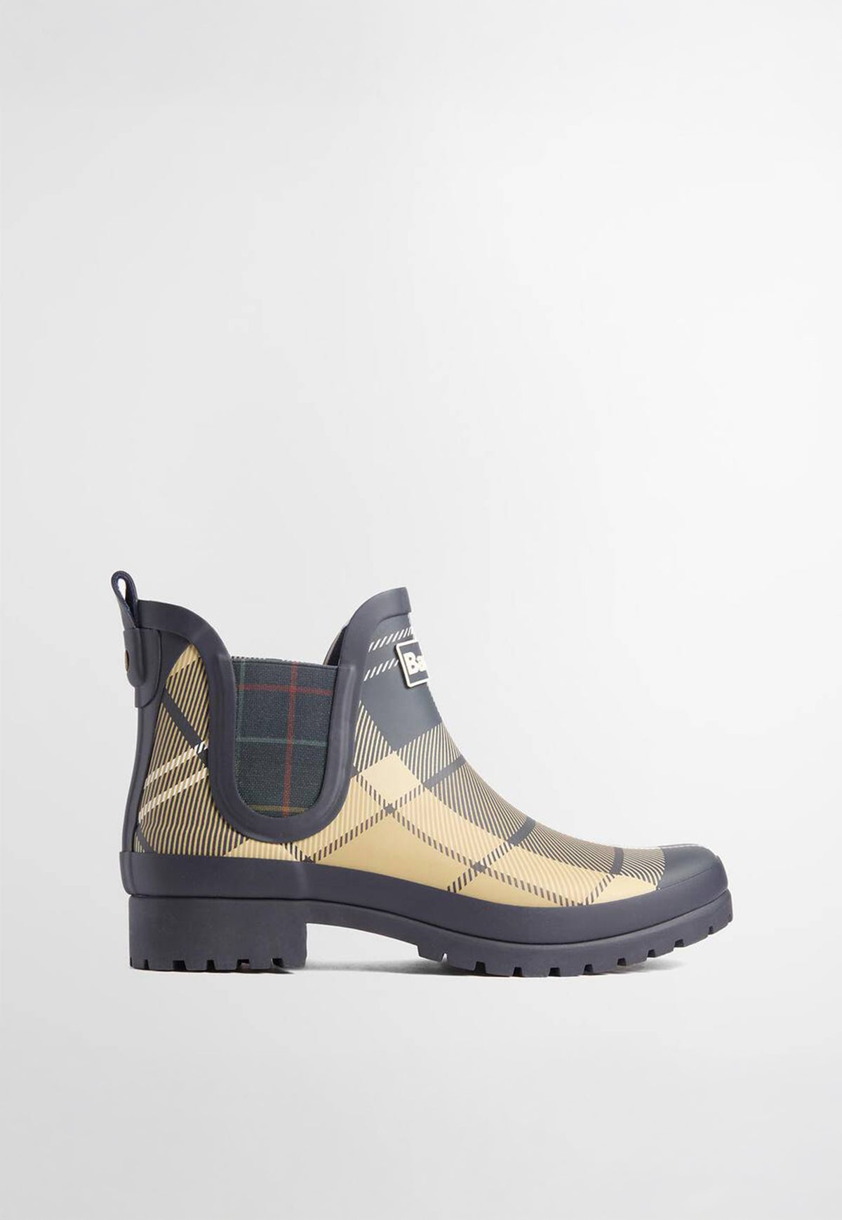 Side profile of Barbour Mallow Chelsea Wellingtons showing the elasticated side gusset and streamlined rubber construction.