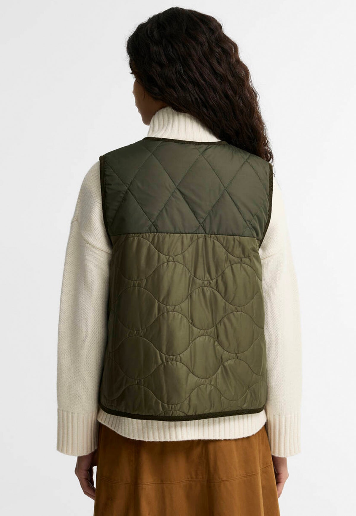 Back of the Barbour Nunwell Reversible Quilted Liner showing its quilted design and sleeveless silhouette.