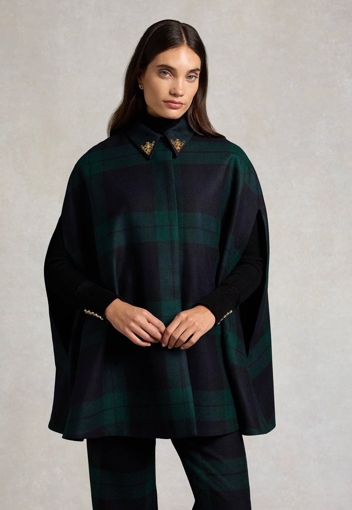 Holland Cooper Knightsbridge Cape in Blackwatch tartan, featuring a tailored shoulder fit, gold HC collar hardware and signature embroidered back detailing.